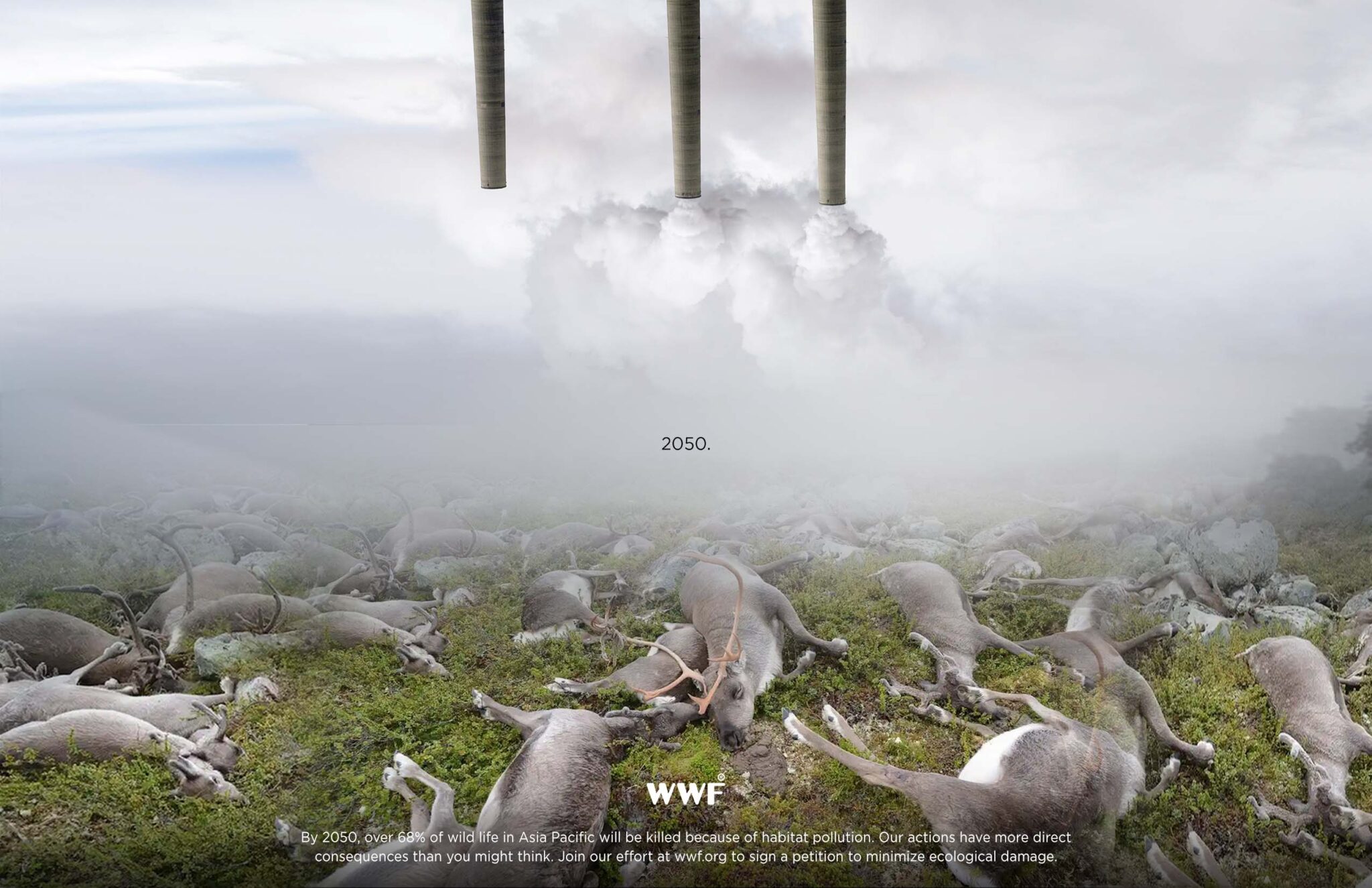 Elk lie dead in a field while smoke stacks produce pollution in the background.