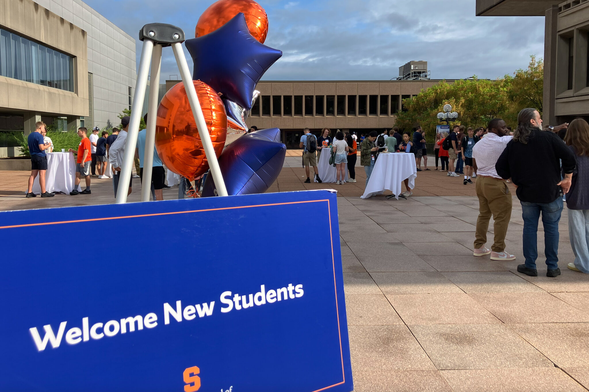newhouse patio filled with students for welcome back day.