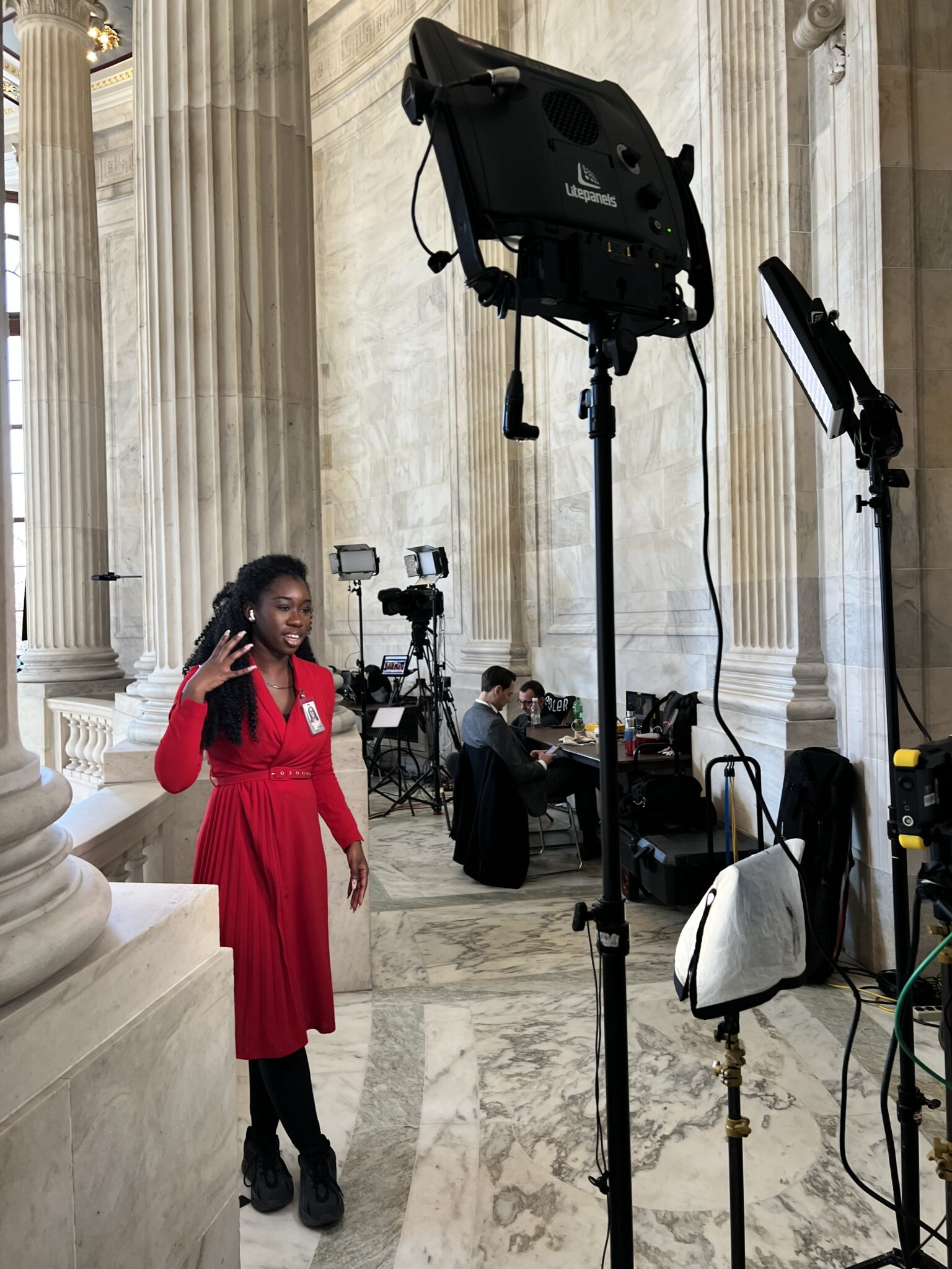 Nurielle Auguste reporting in the United States capitol building.