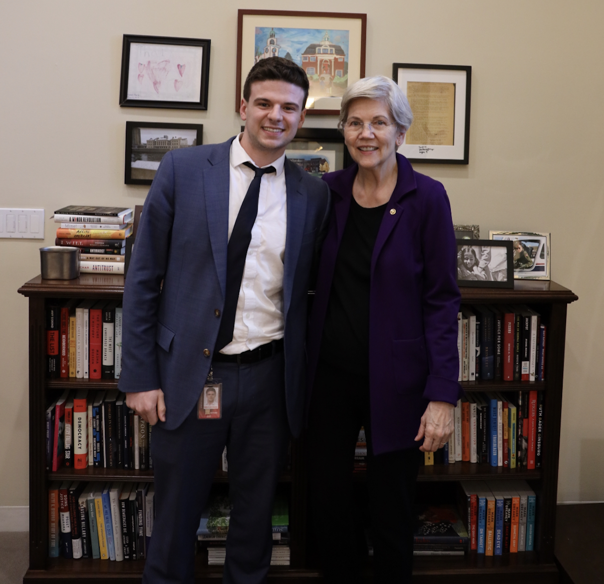 Newhouse student Aidan Hayes stands next to Elizabeth Warren