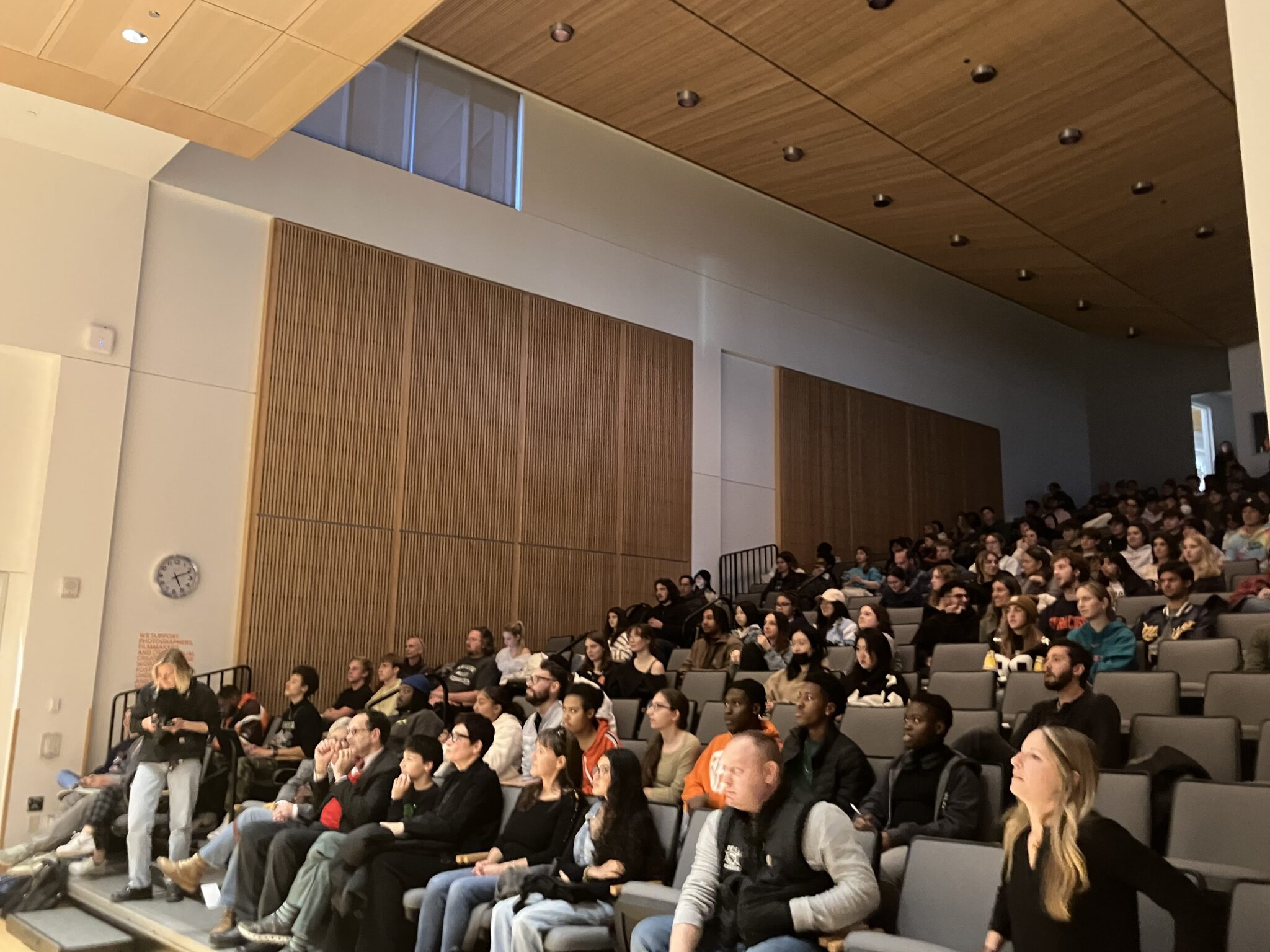 a crowd in an auditorium