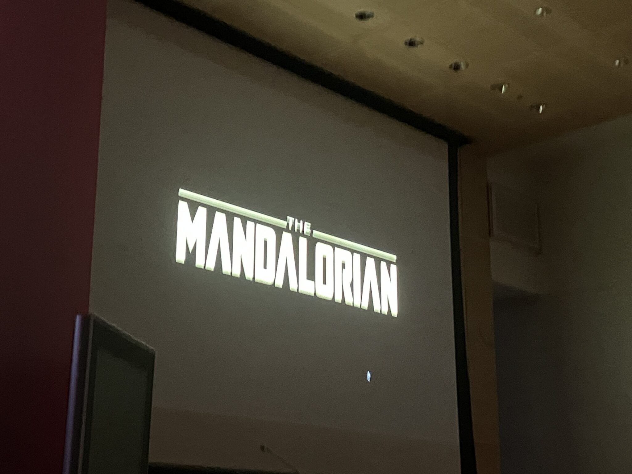 A screen showing "The Mandalorian" title