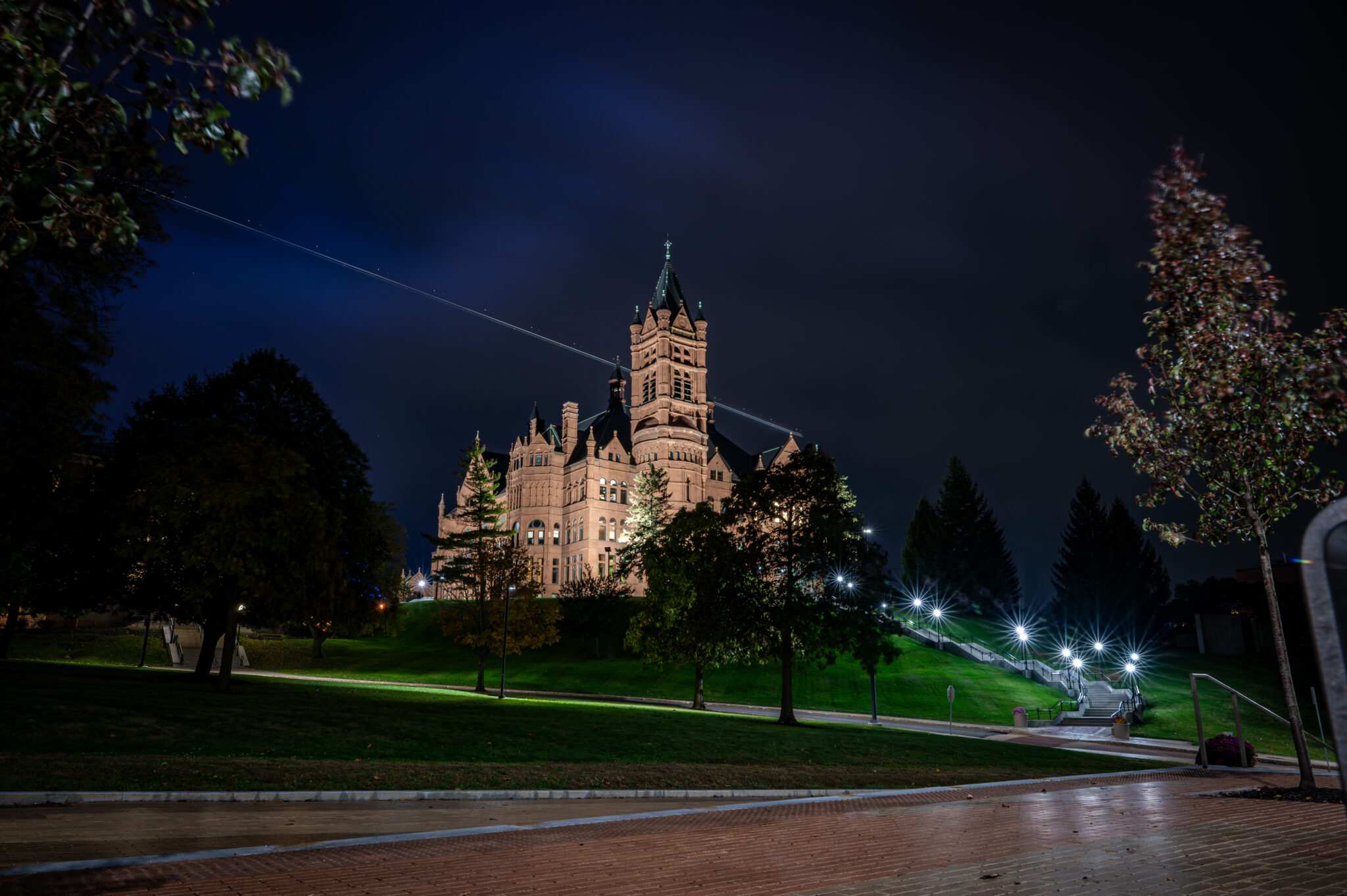 exterior nighttime shot of Crouse College on Syracuse University's campus