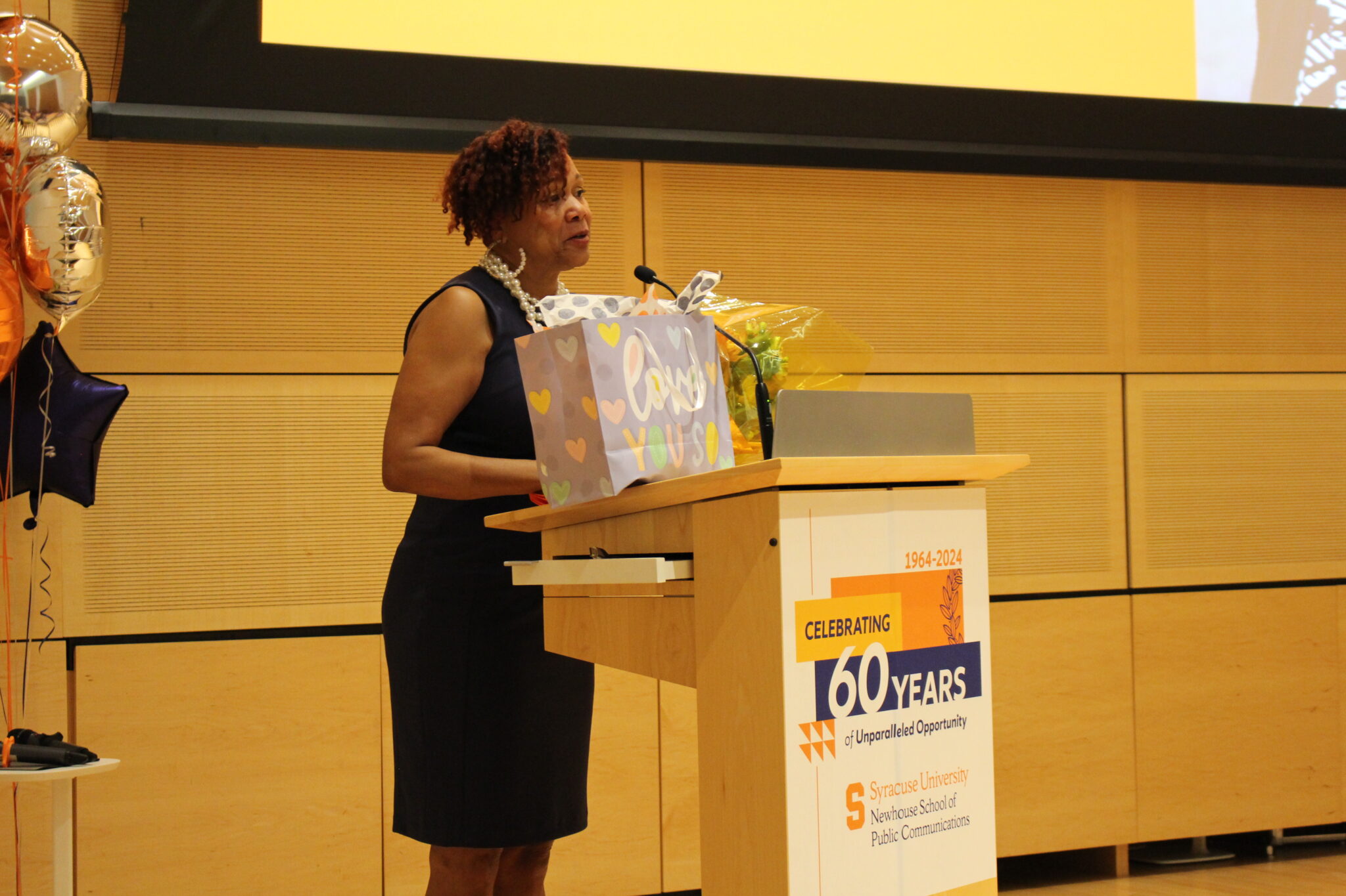 a person speaks at a podium